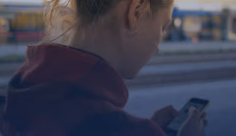 woman looking at her phone